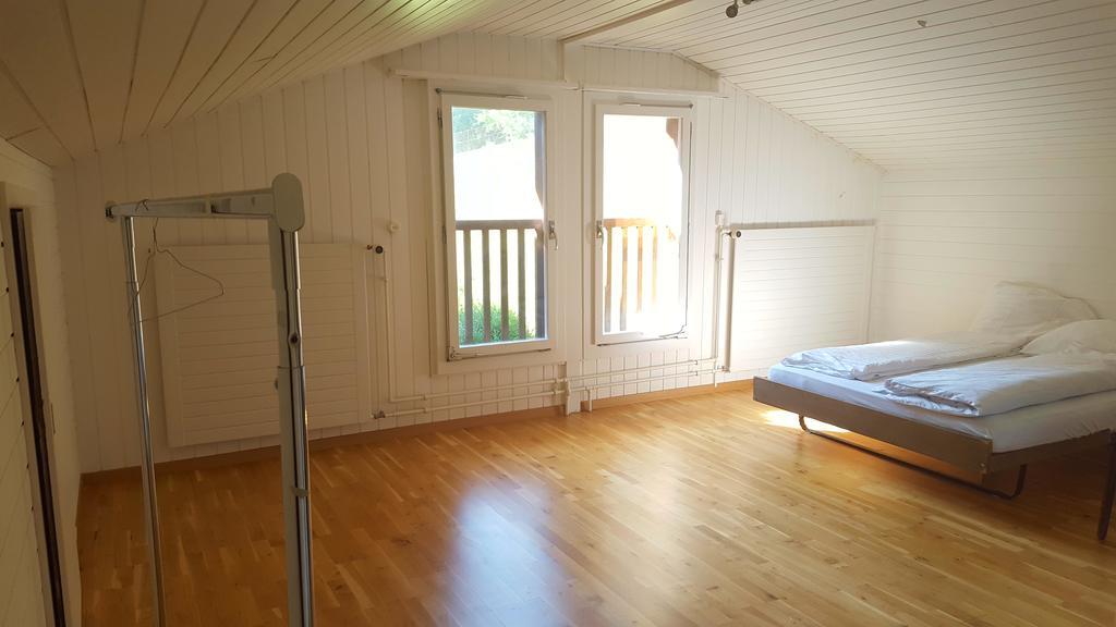 Guest House Bellerive Faulensee Extérieur photo