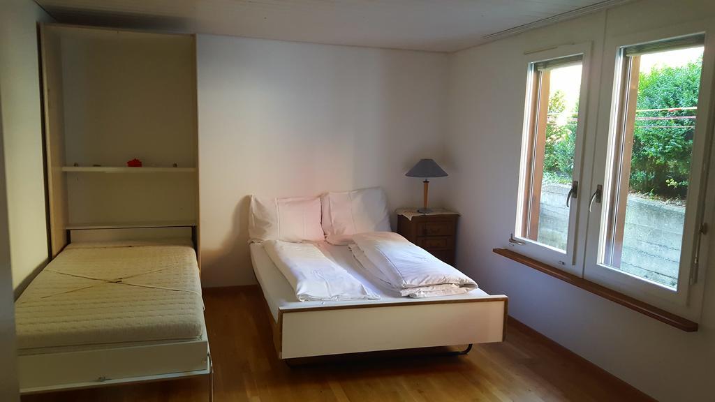 Guest House Bellerive Faulensee Extérieur photo