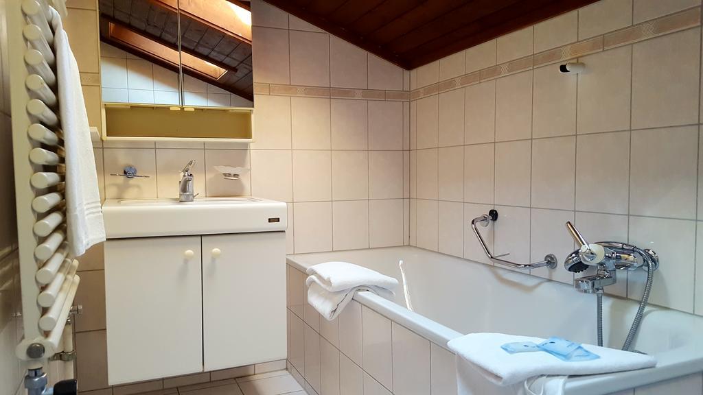 Guest House Bellerive Faulensee Extérieur photo